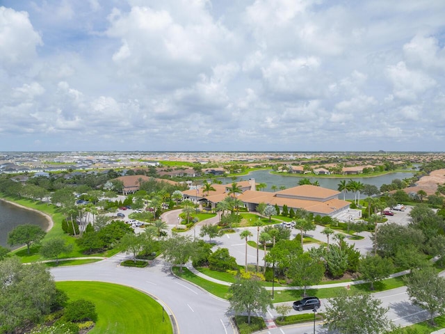 10245 SW Reggiani Rd, Port Saint Lucie, FL 34986 - drone / aerial view featuring a water view and a residential view