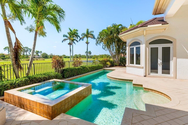 view of pool featuring an in ground hot tub, french doors, fence, a fenced in pool, and a patio
