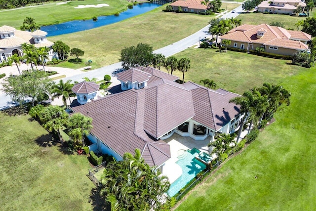 aerial view with a water view, a residential view, and golf course view