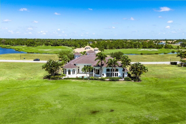 bird's eye view featuring a water view and view of golf course