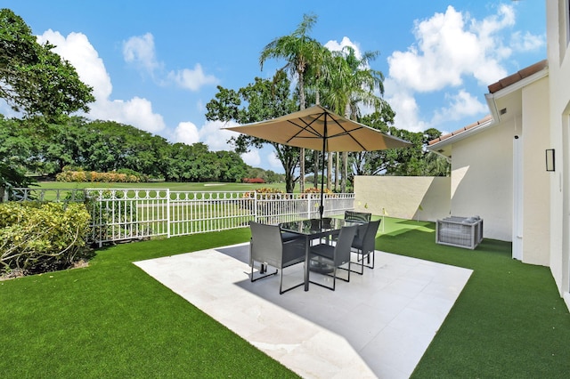 5607 NW 24th Ter, Boca Raton, FL 33496 - view of patio / terrace with outdoor dining area and a fenced backyard