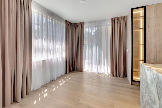 5607 NW 24th Ter, Boca Raton, FL 33496 - empty room featuring light wood-style floors