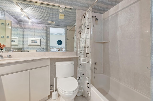 7578 Regency Lake Dr Unit 702, Boca Raton, FL 33433 - full bathroom with rail lighting, vanity, toilet, and shower / bathtub combination with curtain