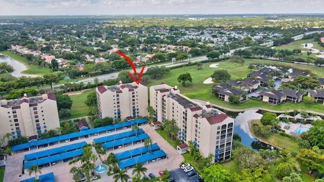 7578 Regency Lake Dr Unit 702, Boca Raton, FL 33433 - bird's eye view featuring a water view and view of golf course