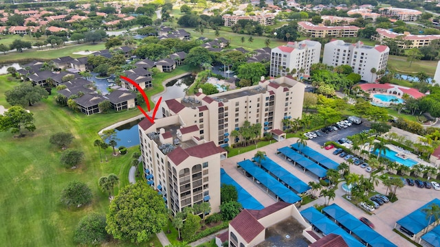7578 Regency Lake Dr Unit 702, Boca Raton, FL 33433 - bird's eye view featuring a water view and golf course view
