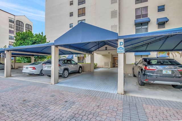 7578 Regency Lake Dr Unit 702, Boca Raton, FL 33433 - view of covered parking lot