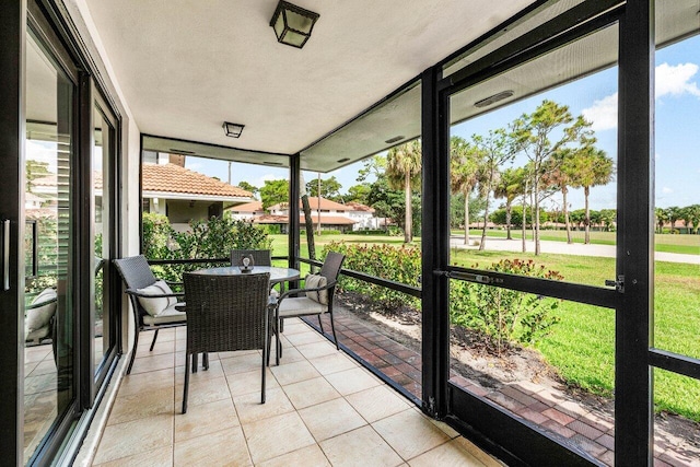 4107 Kittiwake Ct Kittiwake, Unit Kittiwake, Boynton Beach, FL 33436 - sunroom / solarium featuring outdoor dining space