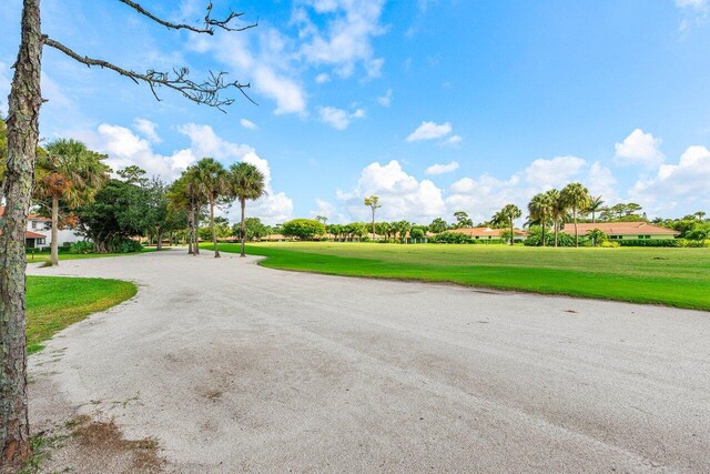 4107 Kittiwake Ct Kittiwake, Unit Kittiwake, Boynton Beach, FL 33436 - view of asphalt road with view of golf course