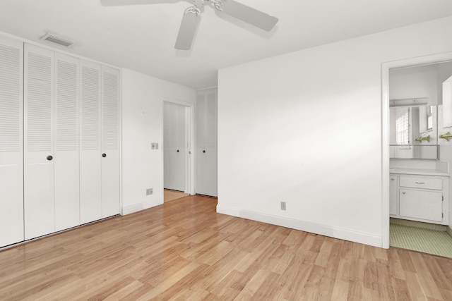 unfurnished bedroom featuring baseboards, ceiling fan, and light wood finished floors