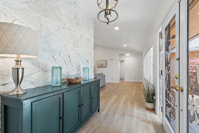 1256 Holly Cove Dr, Jupiter, FL 33458 - hall with light wood-style floors, baseboards, recessed lighting, a chandelier, and vaulted ceiling