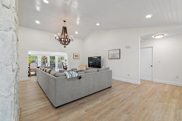 1256 Holly Cove Dr, Jupiter, FL 33458 - living area featuring recessed lighting, baseboards, lofted ceiling, and light wood-style floors