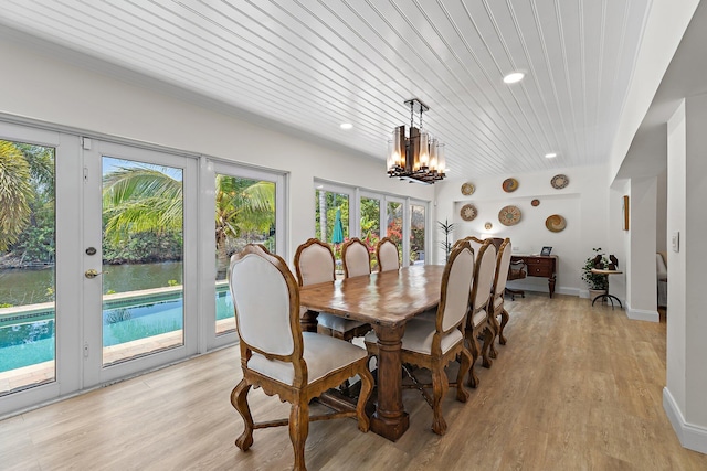 1256 Holly Cove Dr, Jupiter, FL 33458 - dining area featuring recessed lighting, an inviting chandelier, wooden ceiling, and light wood-type flooring