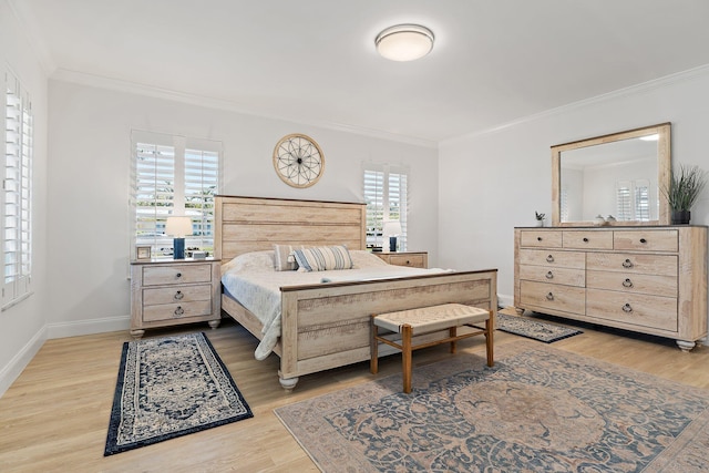 1256 Holly Cove Dr, Jupiter, FL 33458 - bedroom featuring crown molding, multiple windows, and wood finished floors