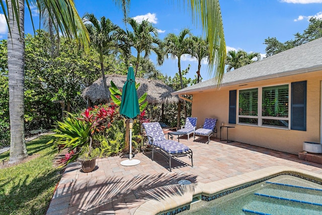 1256 Holly Cove Dr, Jupiter, FL 33458 - view of patio / terrace featuring an outdoor pool