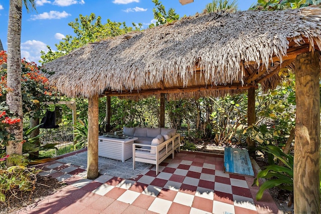 1256 Holly Cove Dr, Jupiter, FL 33458 - view of patio featuring a gazebo and an outdoor living space