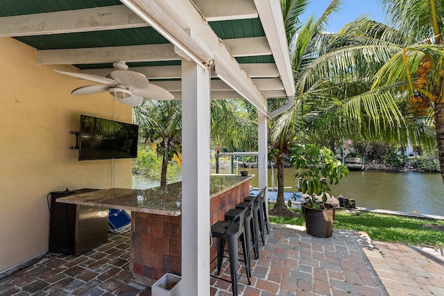 1256 Holly Cove Dr, Jupiter, FL 33458 - view of patio / terrace featuring a ceiling fan and outdoor dry bar