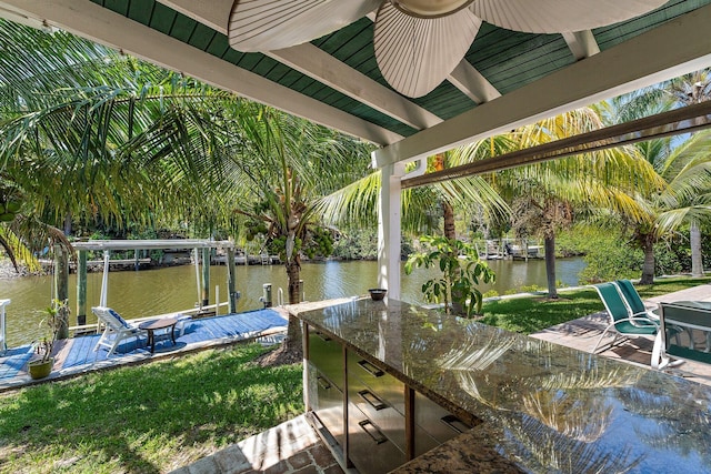 1256 Holly Cove Dr, Jupiter, FL 33458 - view of dock featuring a water view, boat lift, and outdoor dry bar