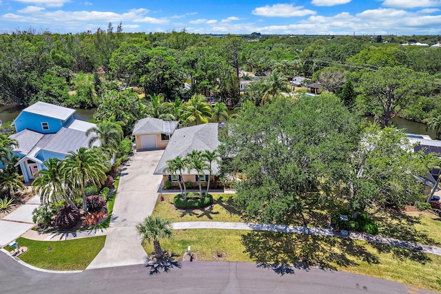 1256 Holly Cove Dr, Jupiter, FL 33458 - bird's eye view with a forest view