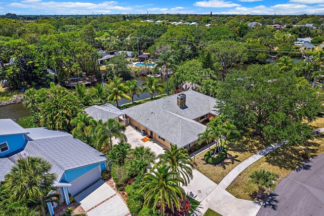1256 Holly Cove Dr, Jupiter, FL 33458 - birds eye view of property with a wooded view