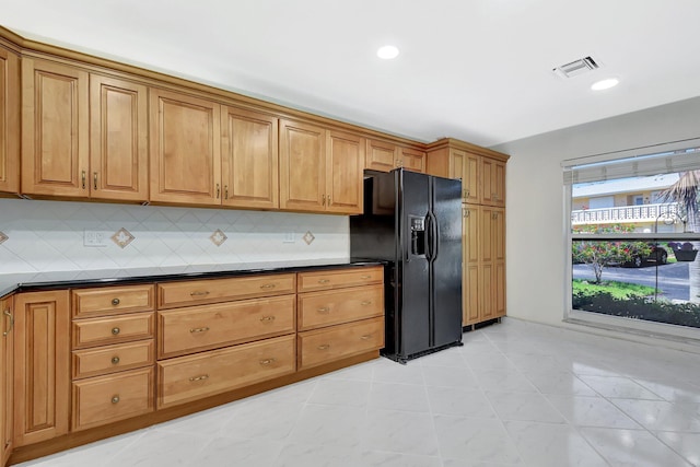 1341 NW 19 Th Ter Unit A, Delray Beach, FL 33445 - kitchen with black fridge with ice dispenser, dark countertops, backsplash, and recessed lighting