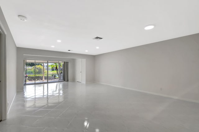 1341 NW 19 Th Ter Unit A, Delray Beach, FL 33445 - unfurnished room featuring baseboards, a smoke detector, and recessed lighting