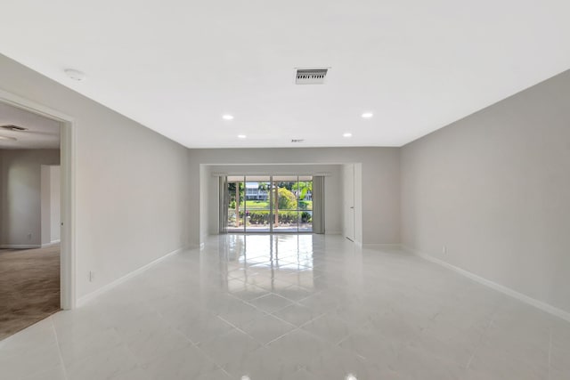 1341 NW 19 Th Ter Unit A, Delray Beach, FL 33445 - unfurnished room with baseboards, recessed lighting, and light tile patterned floors