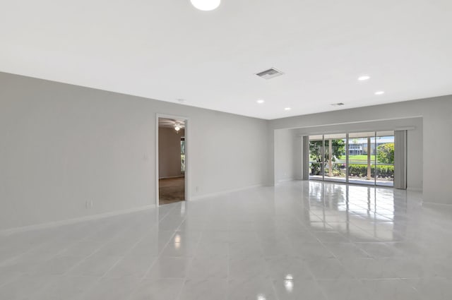 1341 NW 19 Th Ter Unit A, Delray Beach, FL 33445 - unfurnished room with baseboards, light tile patterned floors, recessed lighting, and a ceiling fan