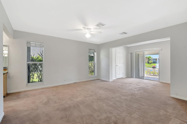 1341 NW 19 Th Ter Unit A, Delray Beach, FL 33445 - unfurnished room featuring light carpet, baseboards, and a ceiling fan