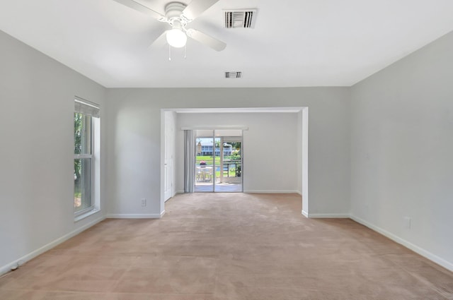 1341 NW 19 Th Ter Unit A, Delray Beach, FL 33445 - empty room with light colored carpet, a ceiling fan, and baseboards