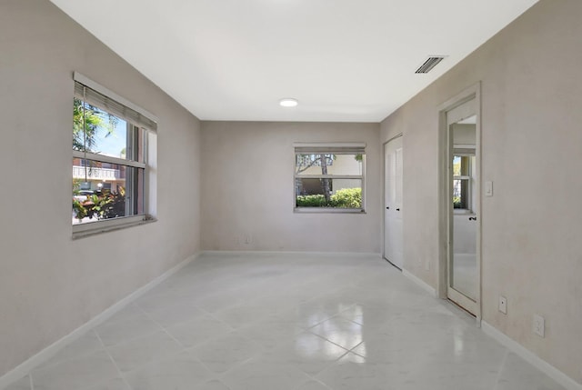 1341 NW 19 Th Ter Unit A, Delray Beach, FL 33445 - unfurnished room featuring baseboards and light tile patterned floors