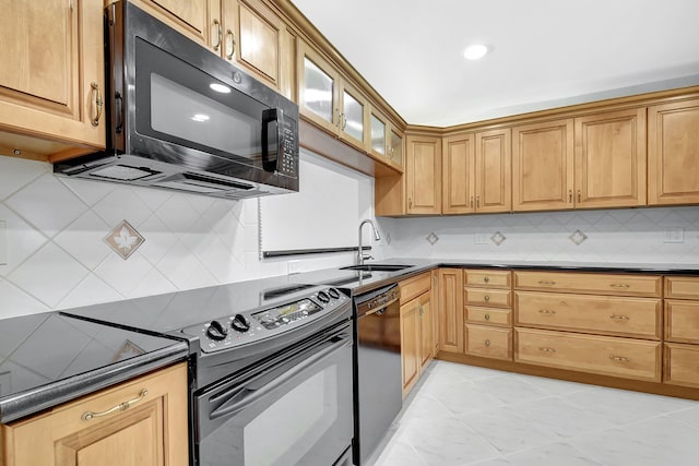 1341 NW 19 Th Ter Unit A, Delray Beach, FL 33445 - kitchen featuring black appliances, dark countertops, a sink, decorative backsplash, and recessed lighting