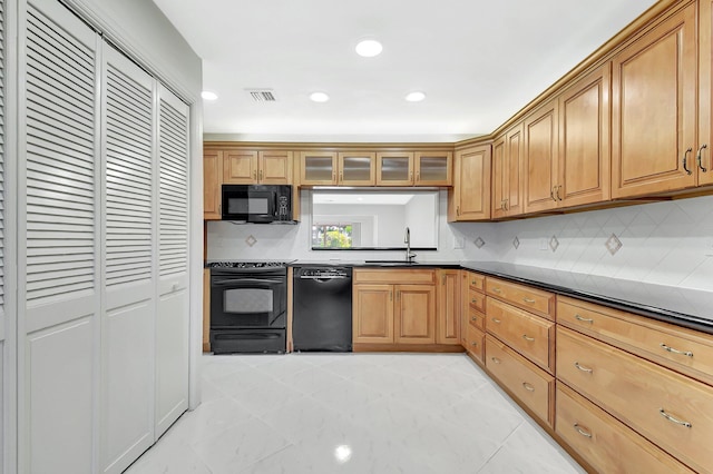 1341 NW 19 Th Ter Unit A, Delray Beach, FL 33445 - kitchen featuring black appliances, a sink, dark countertops, tasteful backsplash, and recessed lighting