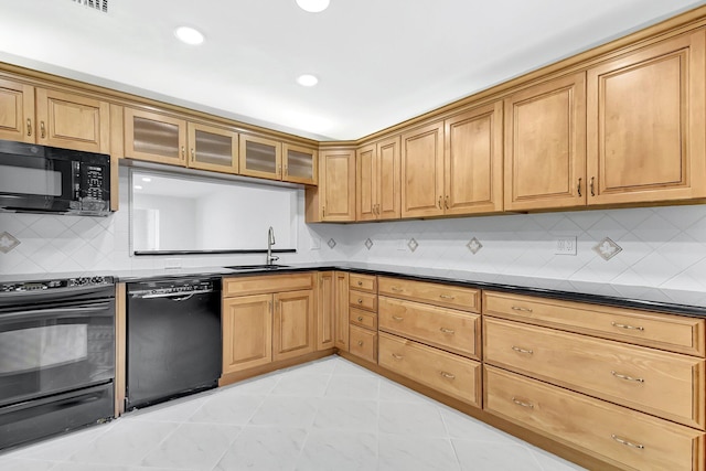 1341 NW 19 Th Ter Unit A, Delray Beach, FL 33445 - kitchen featuring black appliances, dark countertops, tasteful backsplash, glass insert cabinets, and recessed lighting