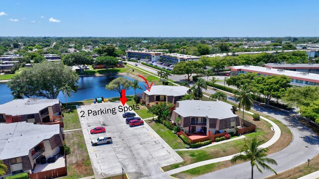 44 Springdale Cir, Palm Springs, FL 33461 - aerial view of a nearby body of water