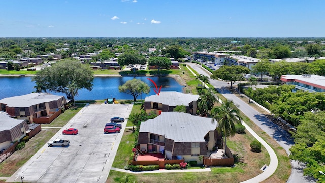 drone / aerial view with a water view