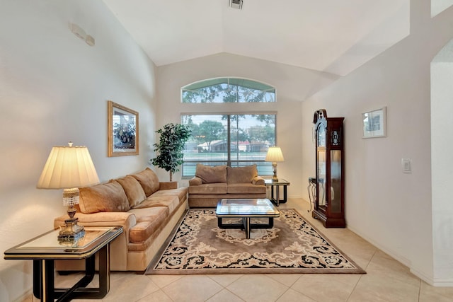 12249 Blair Ave, Boynton Beach, FL 33437 - living room with vaulted ceiling, light tile patterned floors, and visible vents