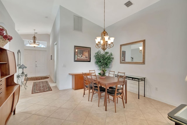 12249 Blair Ave, Boynton Beach, FL 33437 - dining area featuring visible vents, an inviting chandelier, and vaulted ceiling