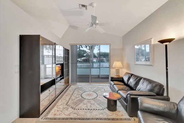 12249 Blair Ave, Boynton Beach, FL 33437 - living room with a ceiling fan, visible vents, and vaulted ceiling