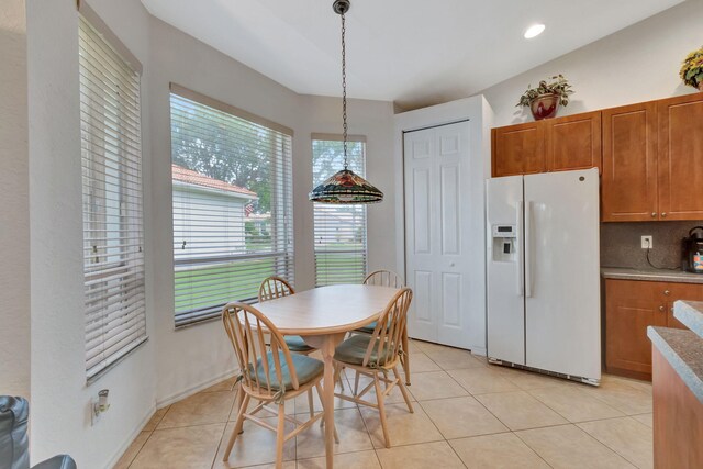 12249 Blair Ave, Boynton Beach, FL 33437 - dining area featuring light tile patterned floors