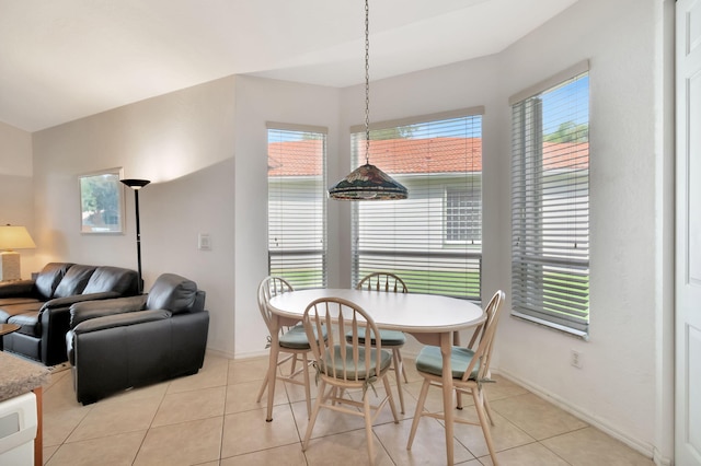 12249 Blair Ave, Boynton Beach, FL 33437 - dining room with baseboards, plenty of natural light, and light tile patterned flooring