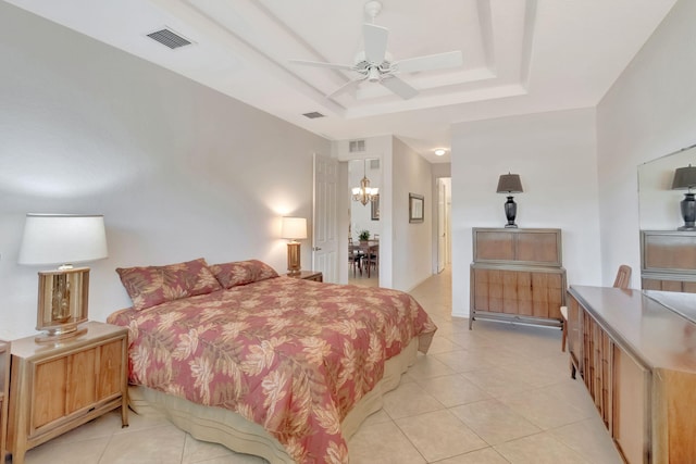 12249 Blair Ave, Boynton Beach, FL 33437 - bedroom with light tile patterned floors, a raised ceiling, and visible vents