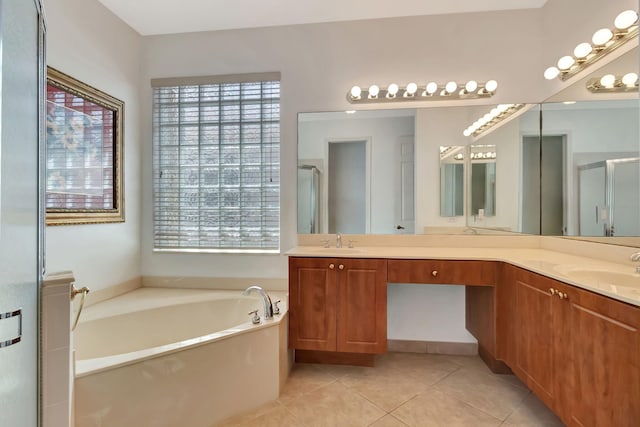 12249 Blair Ave, Boynton Beach, FL 33437 - bathroom with tile patterned flooring, plenty of natural light, a sink, and a garden tub