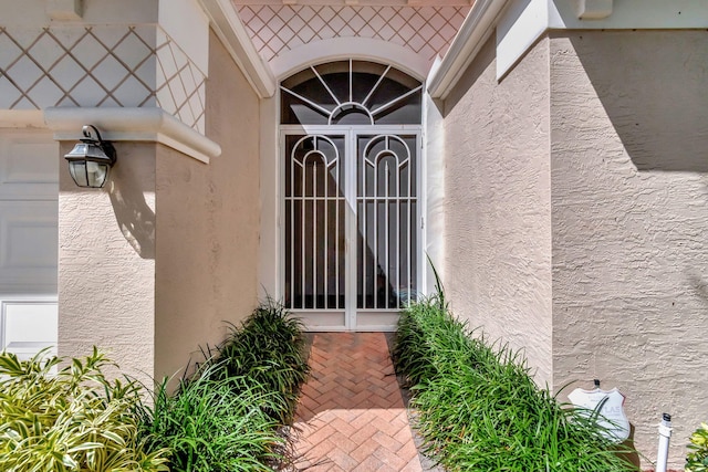 12249 Blair Ave, Boynton Beach, FL 33437 - property entrance with stucco siding