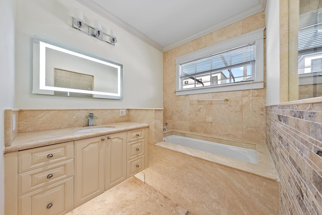 full bathroom with tile walls, vanity, crown molding, and a bath