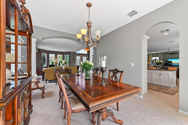 2256 Ridgewood Ct, Royal Palm Beach, FL 33411 - dining space with arched walkways, light tile patterned floors, a chandelier, and recessed lighting