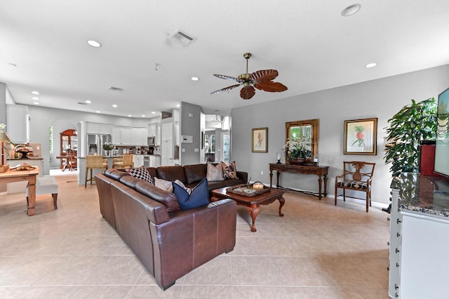 2256 Ridgewood Ct, Royal Palm Beach, FL 33411 - living room with recessed lighting, light tile patterned floors, a ceiling fan, and arched walkways