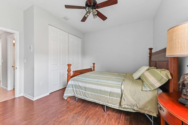 2256 Ridgewood Ct, Royal Palm Beach, FL 33411 - bedroom featuring wood finished floors, a closet, and a ceiling fan