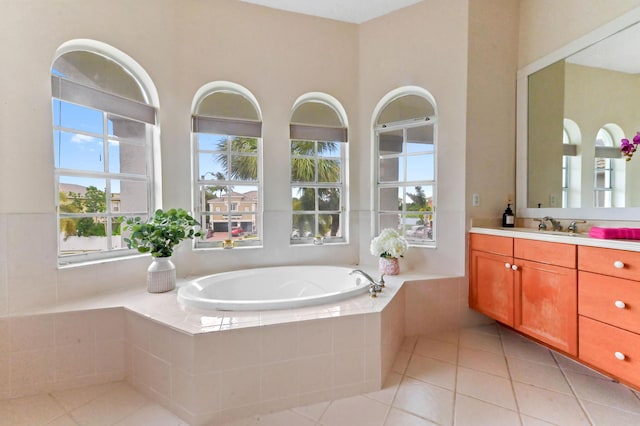 2256 Ridgewood Ct, Royal Palm Beach, FL 33411 - bathroom with vanity, a garden tub, and tile patterned flooring