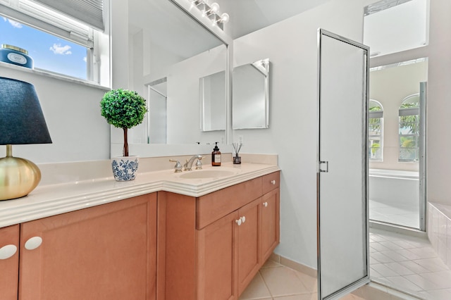 2256 Ridgewood Ct, Royal Palm Beach, FL 33411 - full bathroom featuring vanity, tile patterned flooring, and healthy amount of natural light