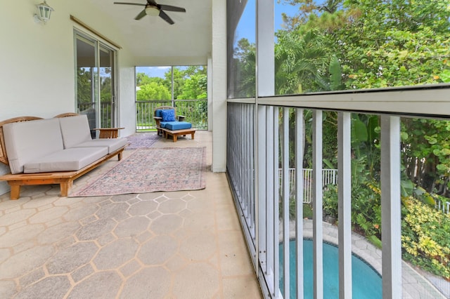 2256 Ridgewood Ct, Royal Palm Beach, FL 33411 - balcony featuring a ceiling fan, view of pool area, and an outdoor living space